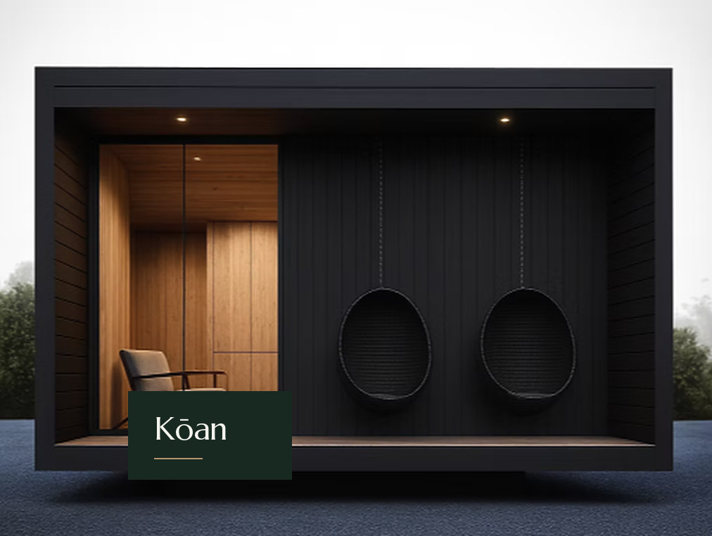 Kōan studio with a deep black frame, an oak-lined alcove and two hanging chairs